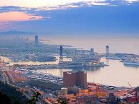 Dawn light over Barcelona harbor